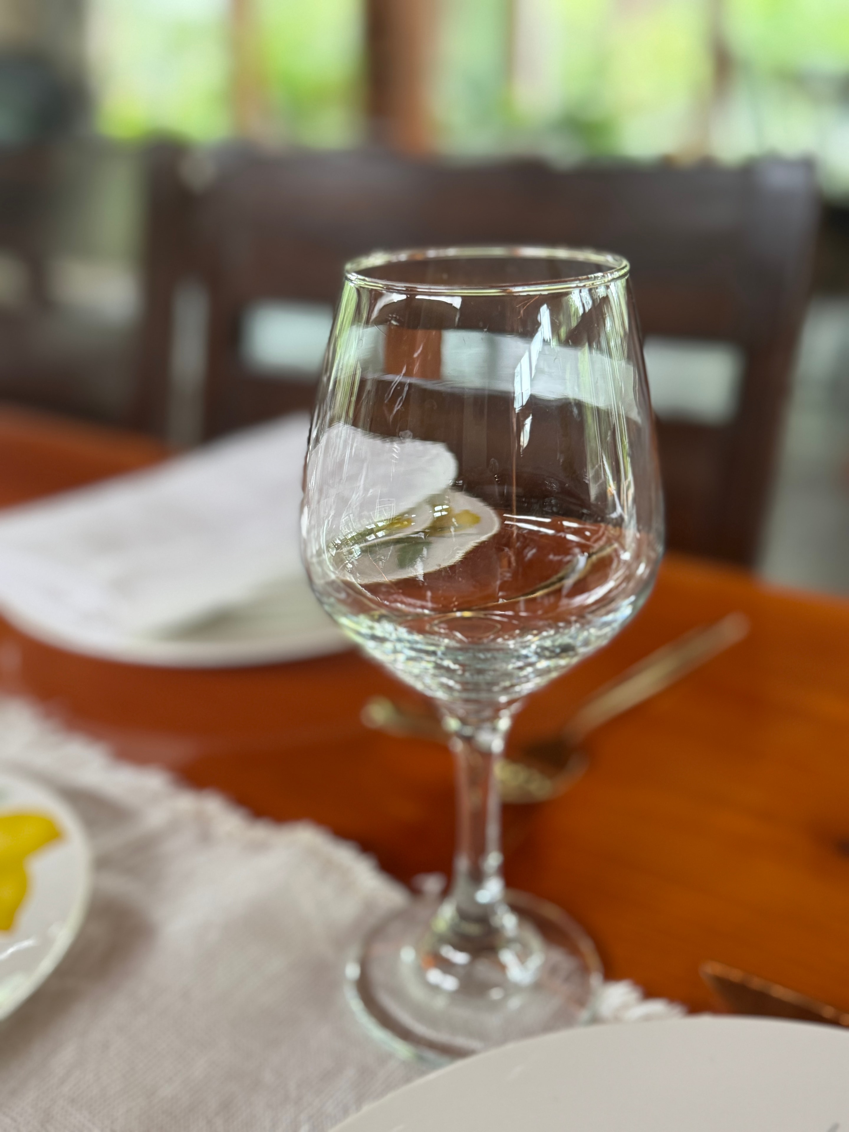 Crystal wine glass on a farm table