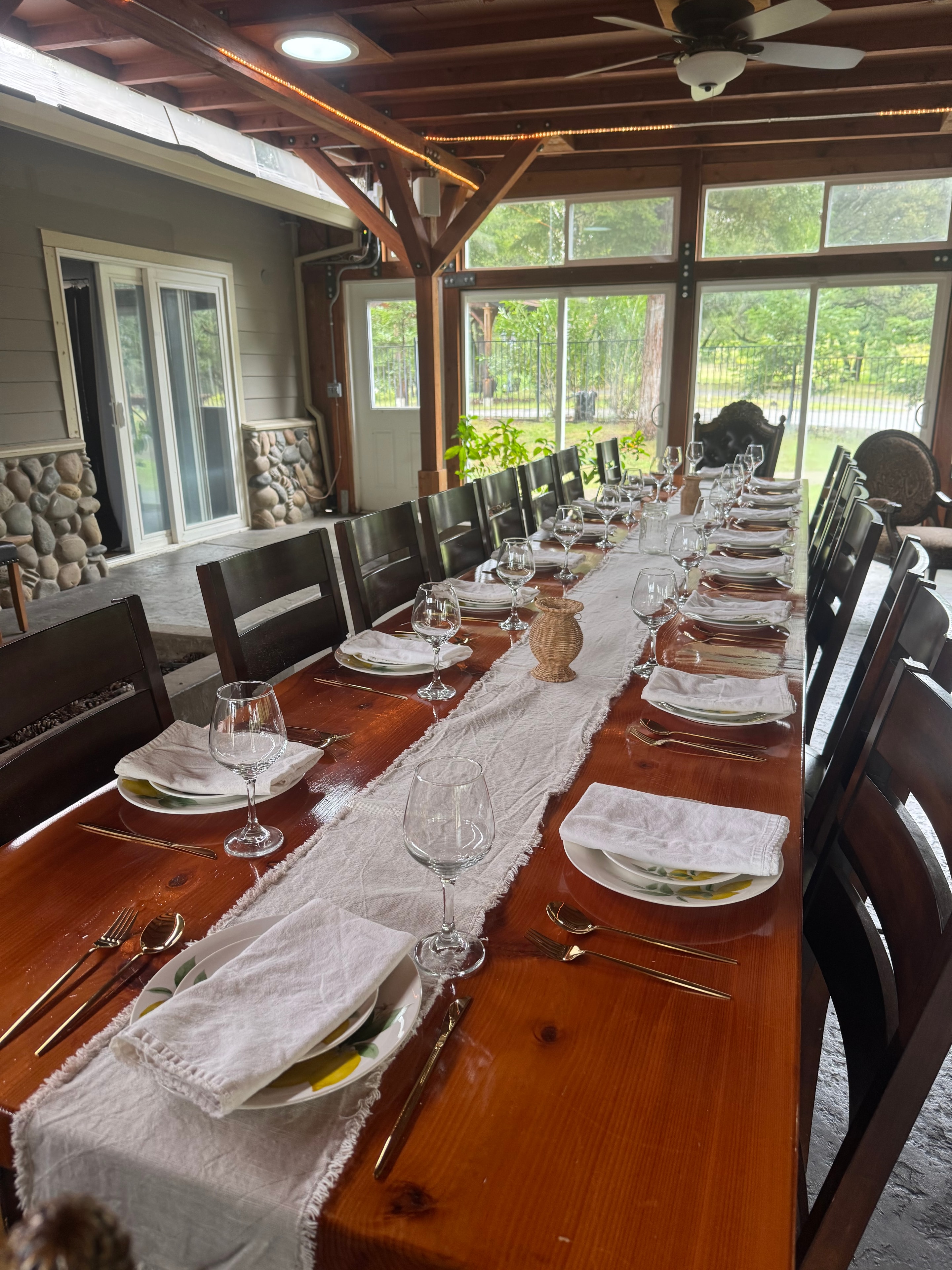 Indoor farm table set with lemon plates and linen runner